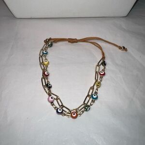 Gold Tone Paperclip and Evil Eye Bead Adjustable Bracelet